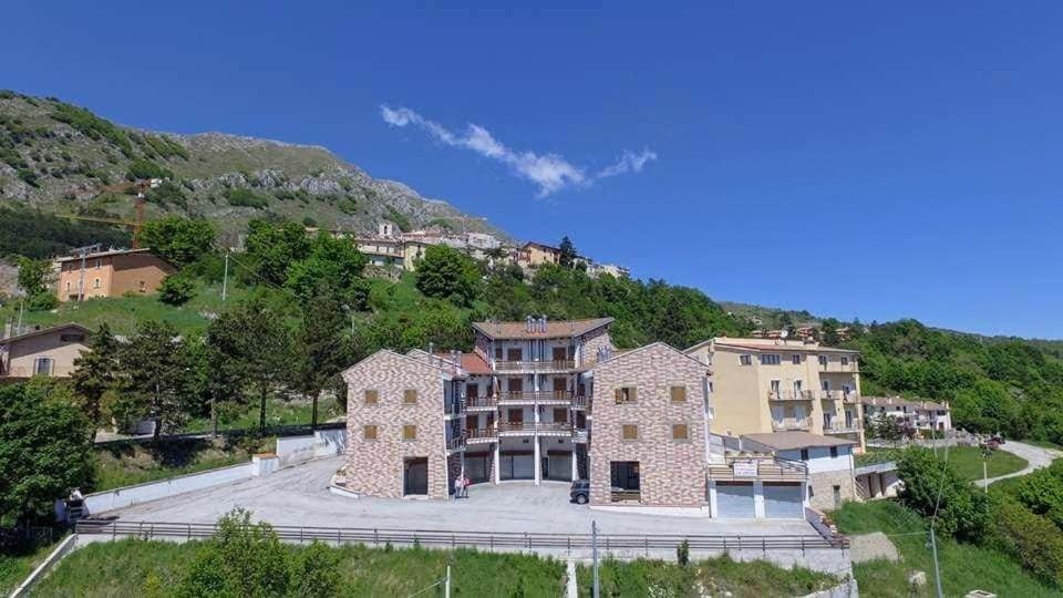Апартаменты Attico E Super Attico Panoramico Рокка-ди-Камбио Экстерьер фото